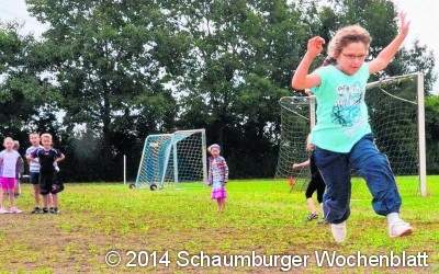 Zwei Runden um den Sportplatz drehen
