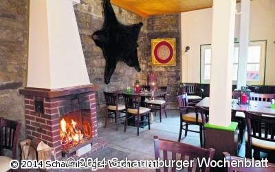 Mit Kamin und Bärenfell