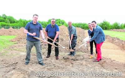 Erster Spatenstich für neues Dienstleistungszentrum am Helweg