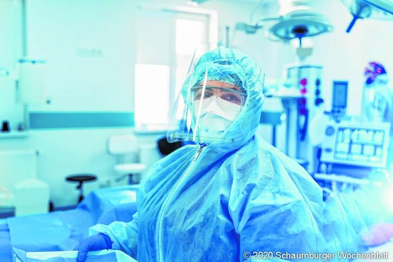 Coronavirus. Covid 19 infected patient in intensive care emergency room. Life saving. Ventilation of the lungs with oxygen.